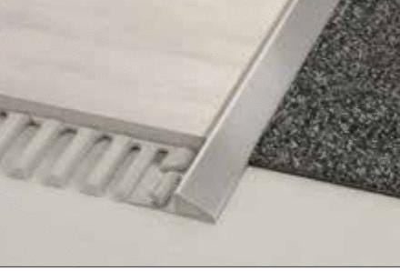 SCHLUTER-RENO-AEU - Profilé permettant de réaliser une transition entre des revêtements de sols de hauteurs différentes